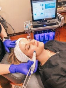 woman having hydra facial treatment